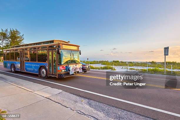 easy rider trolly bus, anna maria island - anna maria island stock pictures, royalty-free photos & images