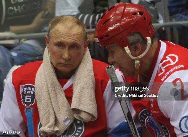 Russian President Vladimir Putin and former NHL player Slava Fetisov attend a gala match of the Night Hockey League teams at the Bolshoy ice arena at...