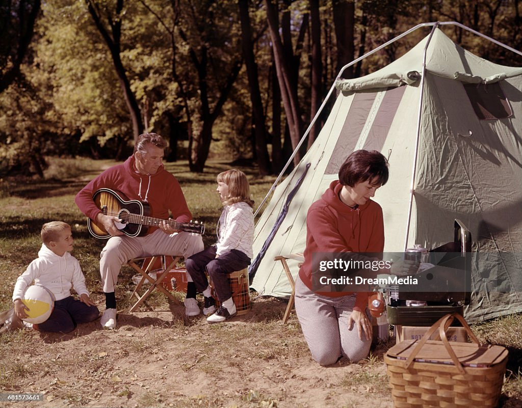 1960s PARENTS WITH SON AND...