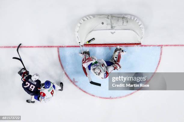 Brock Nelson of USA scores a goal to make it 2-0 against goalkeeper Andreas Bernard of Italy during the 2017 IIHF Ice Hockey World Championship game...