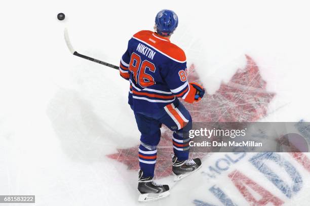 Nikita Nikitin of the Edmonton Oilers warms up before the game against the Arizona Coyotes at Rexall Place on November 16, 2014 in Edmonton, Alberta,...
