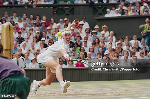 Czech tennis player Jana Novotna pictured in action against Martina Hingis in the final of the Women's Singles tournament at the Wimbledon Lawn...
