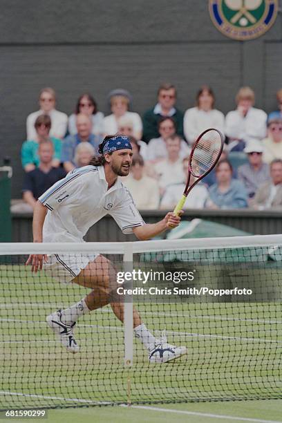 Croatian tennis player Goran Ivanisevic pictured in action to win against Dutch tennis player Richard Krajicek, 6-3, 6-4, 5-7, 6-7, 15-13 in the...