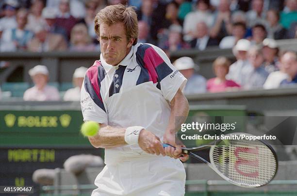 American tennis player Todd Martin pictured in action to lose against fellow American tennis player MaliVai Washington, 7-5, 4-6, 7-6, 3-6, 8-10 in...