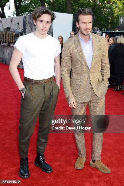 Brooklyn Beckham and David Beckham attend the European premiere of "King Arthur: Legend of the Sword" at Cineworld Empire on May 10, 2017 in London,...