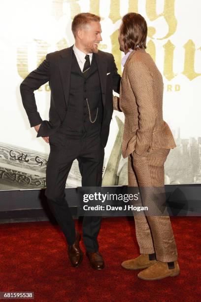 Charlie Hunnam and David Beckham attend the European premiere of "King Arthur: Legend of the Sword" at Cineworld Empire on May 10, 2017 in London,...