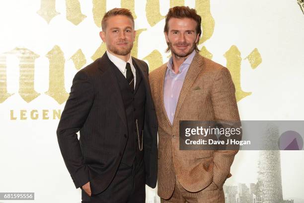 Charlie Hunnam and David Beckham attend the European premiere of "King Arthur: Legend of the Sword" at Cineworld Empire on May 10, 2017 in London,...
