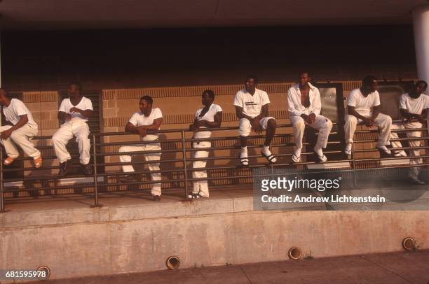 Prisoners leave for work and return to the Limestone Correctional Facility in chains on July 15, 1995 outside of Huntsville, Alabama. The state of...