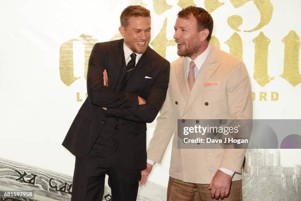 Charlie Hunnam and Guy Ritchie attend the European premiere of "King Arthur: Legend of the Sword" at Cineworld Empire on May 10, 2017 in London,...