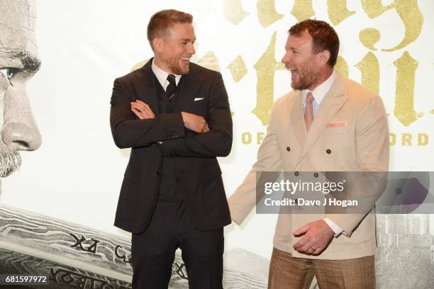 Charlie Hunnam and Guy Ritchie attend the European premiere of "King Arthur: Legend of the Sword" at Cineworld Empire on May 10, 2017 in London,...