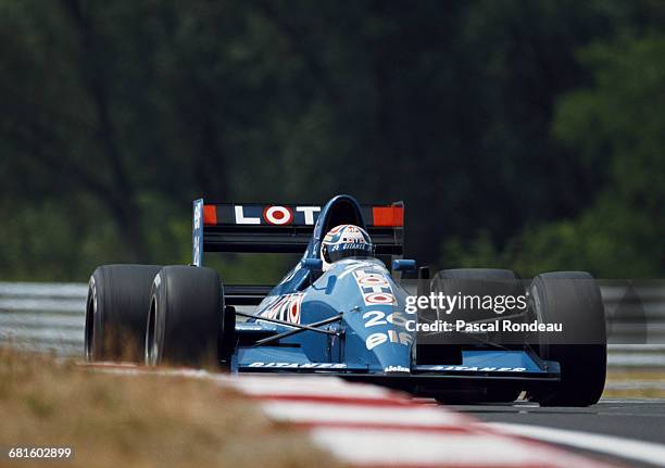 Philippe Alliot of France drives the Ligier Gitanes Ligier JS33B Ford Cosworth DFR V8 during the Grand Prix of Hungary on 12 August 1990 at the...