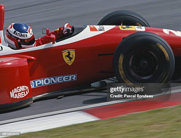 Jean Alesi of France drives the Scuderia Ferrari Ferrari F93A Ferrari 041 V12 during practice for the Yellow Pages South African Grand Prix on 13...