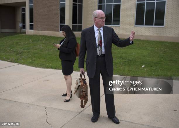 Thomas Kane, an attorney representing Prince's relatives Tyka Nelson and Omarr Baker, walks outside the Carver County District Court in Chaska,...