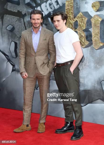 David Beckham and Brooklyn Beckham attend the European premiere of "King Arthur: Legend of the Sword" at Cineworld Empire on May 10, 2017 in London,...