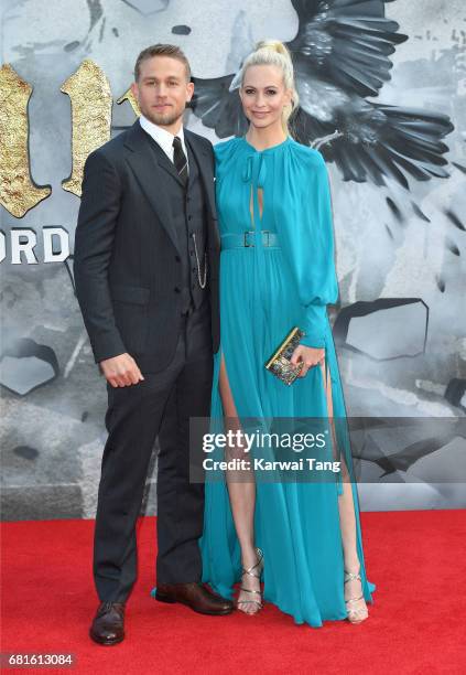 Charlie Hunnam and Poppy Delevingne attend the European premiere of "King Arthur: Legend of the Sword" at Cineworld Empire on May 10, 2017 in London,...