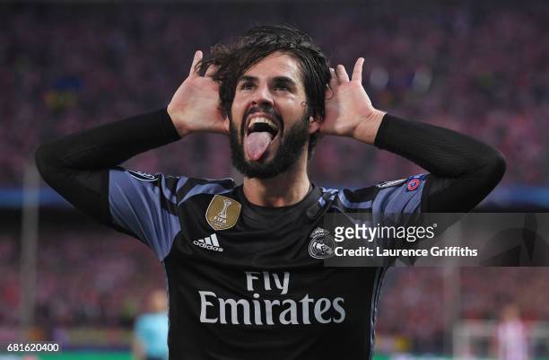 Isco of Real Madrid celebrates scoring his team's opening goal during the UEFA Champions League Semi Final second leg match between Club Atletico de...
