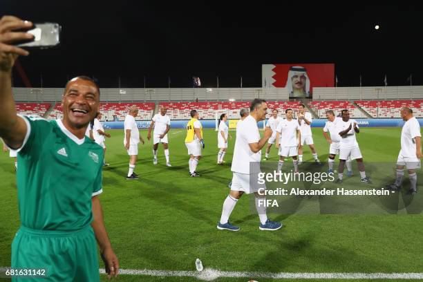 Legend Cafu of Brazil takes a selfie prior to a FIFA Football Tournament, ahead of the 67th FIFA Congress, at Bahrain National Stadium on May 10,...