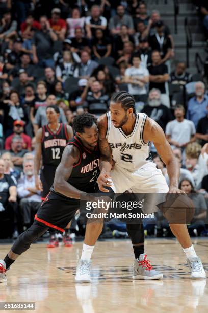 Kawhi Leonard of the San Antonio Spurs handles the ball against the Houston Rockets during Game Two of the Eastern Conference Semifinals of the 2017...