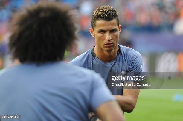 Cristiano Ronaldo, #7 of Real Madrid stretchs prior the UEFA Champions League quarter final first leg match between Club Atletico de Madrid and Real...