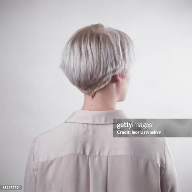 portrait of blond woman in studio - short hair fotografías e imágenes de stock