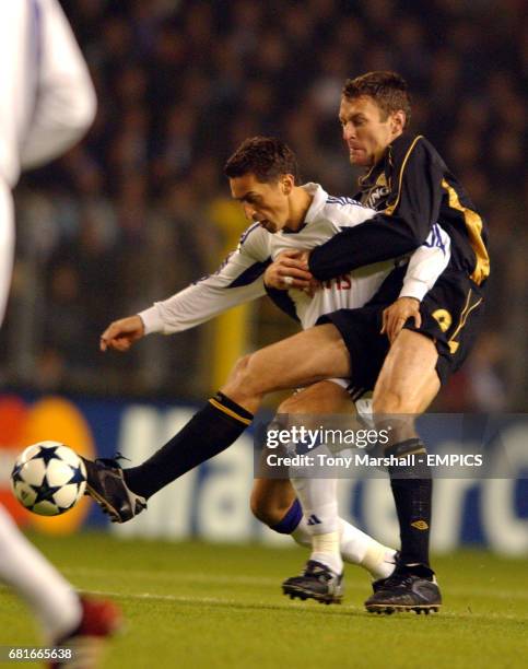 Anderlecht's Besnik Hasi holds off Celtic's Chris Sutton