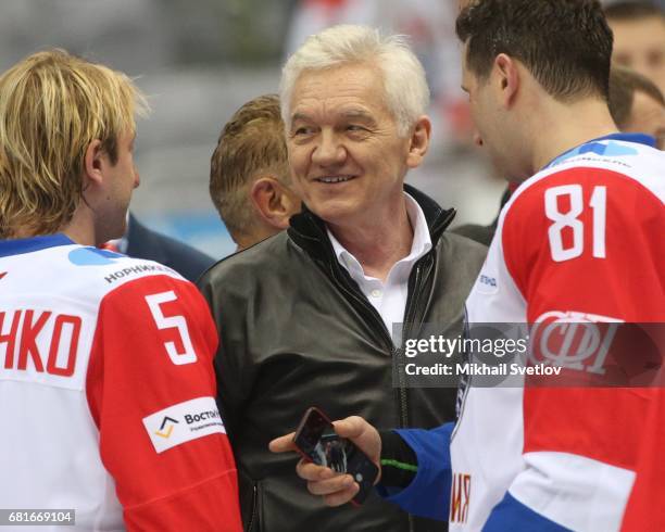 Russian retired figure scater Yevgeny Plushchenko , billionaire and businessman Gennady Timchenko and businessman Roman Rotenberg attend a gala match...