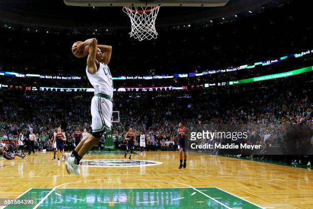 Avery Bradley of the Boston Celtics dunks against the Washington Wizards during the first half of Game Five of the Eastern Conference Semifinals at...
