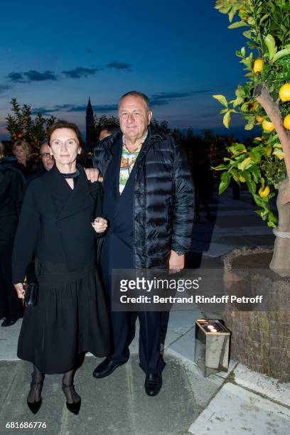 Guest and Jean Pigozzi attend the Cini party during the 57th International Art Biennale on May 10, 2017 in Venice, Italy.