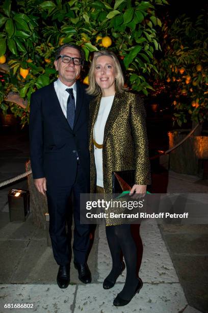 Serge Lasvignes and Emma Lavigne attend the Cini party during the 57th International Art Biennale on May 10, 2017 in Venice, Italy.