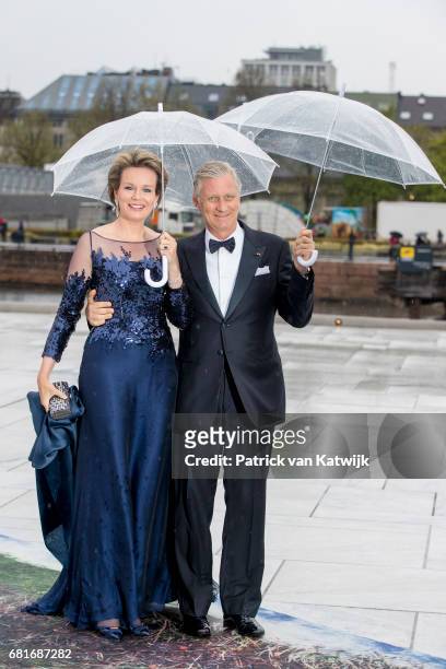 King Philippe and Queen Mathilde of Belgium arrive at the Opera House on the ocassion of the celebration of King Harald and Queen Sonja of Norway...