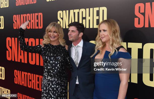 Actor Goldie Hawn, filmmaker Jonathan Levine, and actor/executive producer Amy Schumer attend the premiere of 20th Century Fox's "Snatched" at...