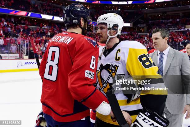 Alex Ovechkin of the Washington Capitals and Sidney Crosby of the Pittsburgh Penguins shake hands after the Penguins defeated the Capitals 2-0 in...