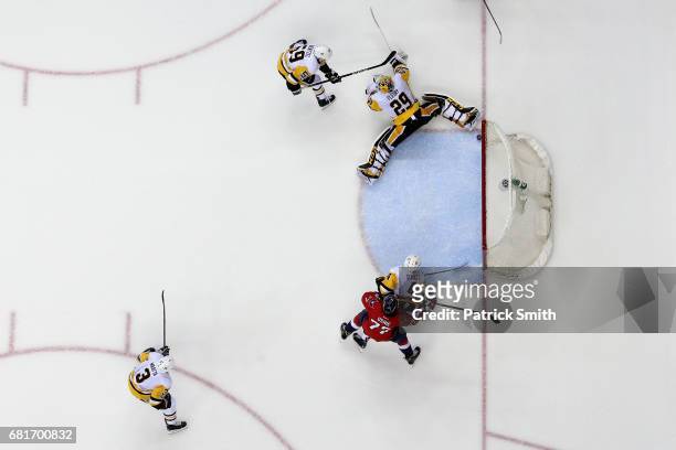 Goalie Marc-Andre Fleury of the Pittsburgh Penguins makes a save against the Washington Capitals in Game Seven of the Eastern Conference Second Round...