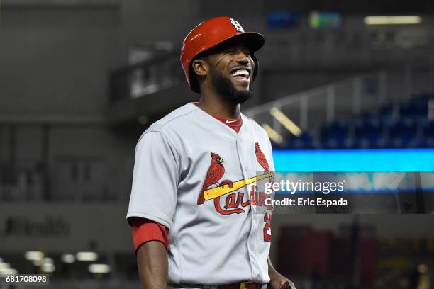 Dexter Fowler of the St. Louis Cardinals smiles after hitting an RBI triple in the sixth inning against the St. Louis Cardinals at Marlins Park on...