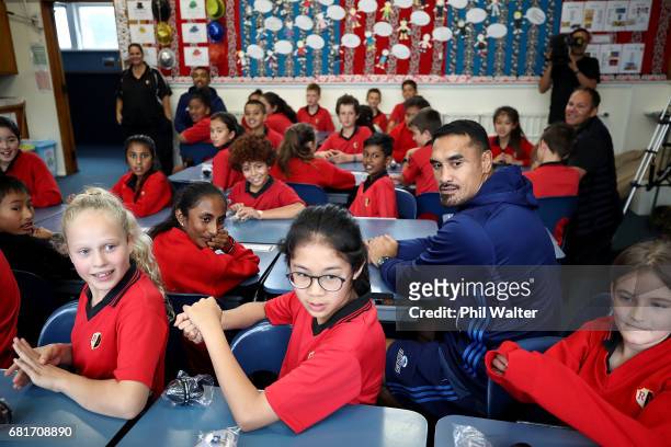 Jerome Kaino of the Auckland Blues sits in class during the New Zealand Lions Series Education Programme Launch at Remuera Intermediate School on May...