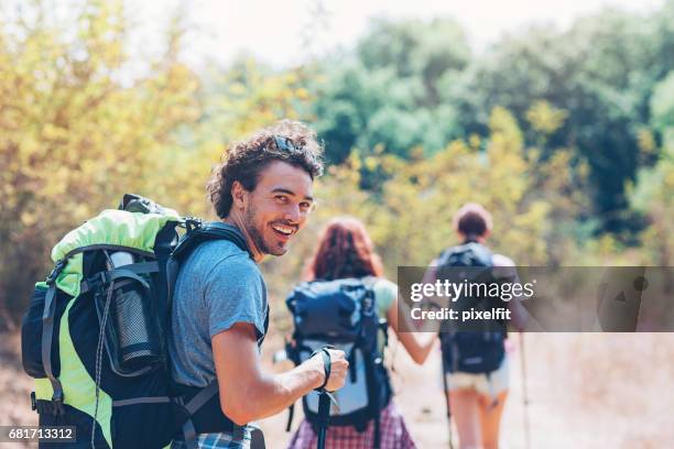 summer vacation in the mountain - people climbing walking mountain group stock pictures, royalty-free photos & images