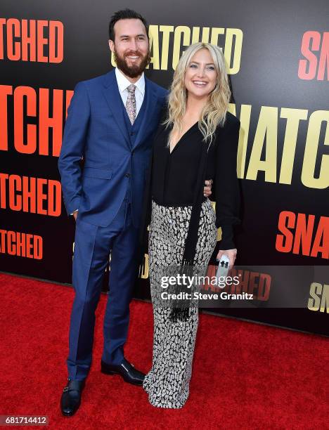 Kate Hudson, Danny Fujikawa arrives at the Premiere Of 20th Century Fox's "Snatched" at Regency Village Theatre on May 10, 2017 in Westwood,...