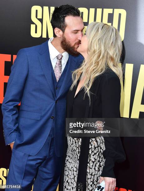 Kate Hudson, Danny Fujikawa arrives at the Premiere Of 20th Century Fox's "Snatched" at Regency Village Theatre on May 10, 2017 in Westwood,...