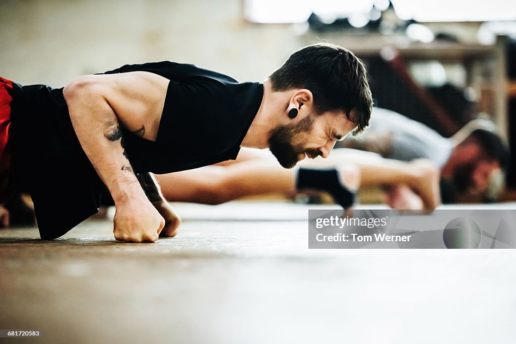 Muay Thai Boxing Athlete doing pushups