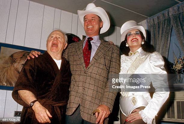 Mickey Rooney, Larry Hagman and Ann Miller backstage at the Broadway musical "Sugar Babies" circa 1980 in New York City.
