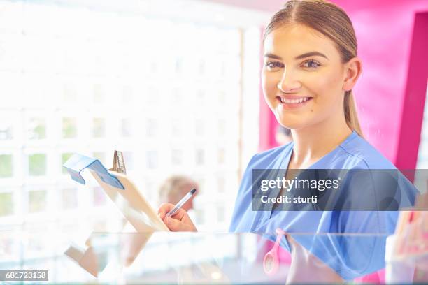 Nurse Using Camera Happy Smiling Nurse Looking At Camera High-Res Stock Photo - Getty Images