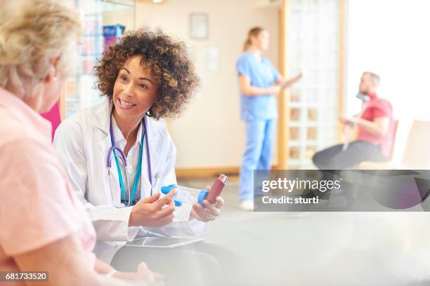 using your inhaler is easy - asthma stock pictures, royalty-free photos & images
