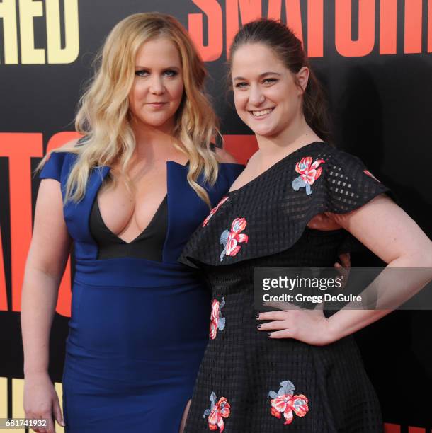 Amy Schumer and sister Kim Caramele arrive at the premiere of 20th Century Fox's "Snatched" at Regency Village Theatre on May 10, 2017 in Westwood,...