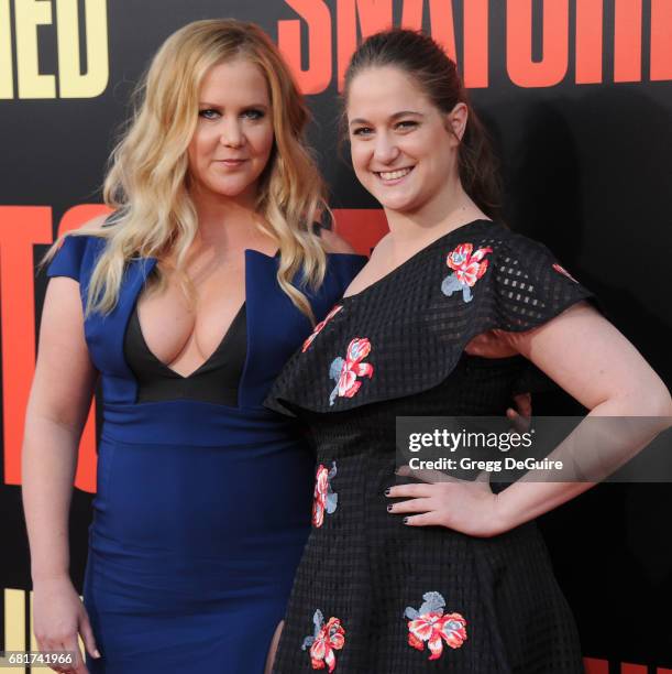 Amy Schumer and sister Kim Caramele arrive at the premiere of 20th Century Fox's "Snatched" at Regency Village Theatre on May 10, 2017 in Westwood,...