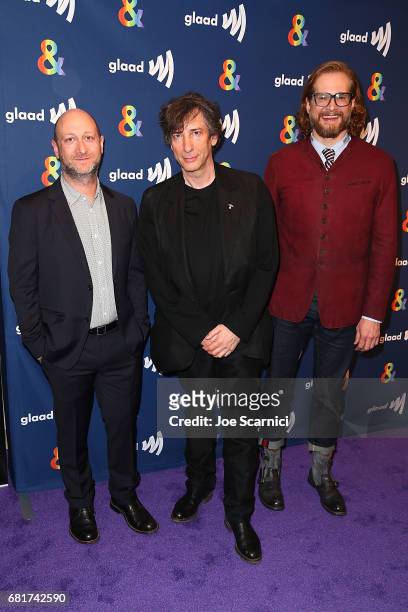 Michael Green, Neil Gaiman and Bryan Fuller arrive at the "American Gods" advance screening In Partnership With GLAAD at The Paley Center for Media...