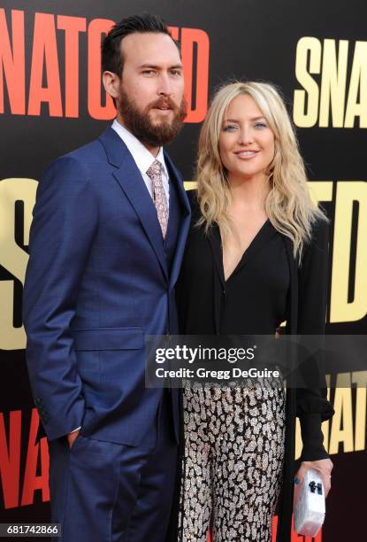 Kate Hudson and Danny Fujikawa arrive at the premiere of 20th Century Fox's "Snatched" at Regency Village Theatre on May 10, 2017 in Westwood,...