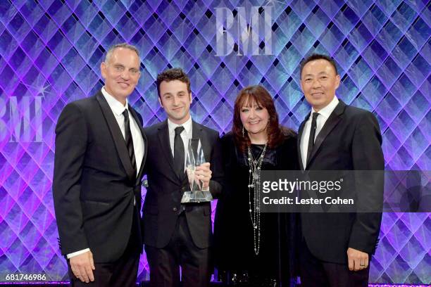 President & CEO Mike O'Neill, honoree Justin Hurwitz, BMI VP Film, TV & Visual Media Relations Doreen Ringer-Ross and Assistant Vice President of...