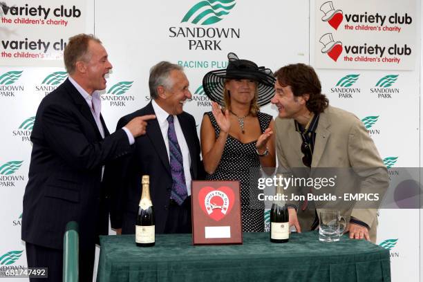 Bobby Davro and Malandra Burrows present the prizes in the winners enclosure