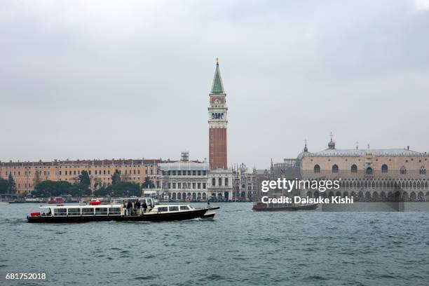 the bell tower of st mark's basilica in venice - 塔 stock pictures, royalty-free photos & images