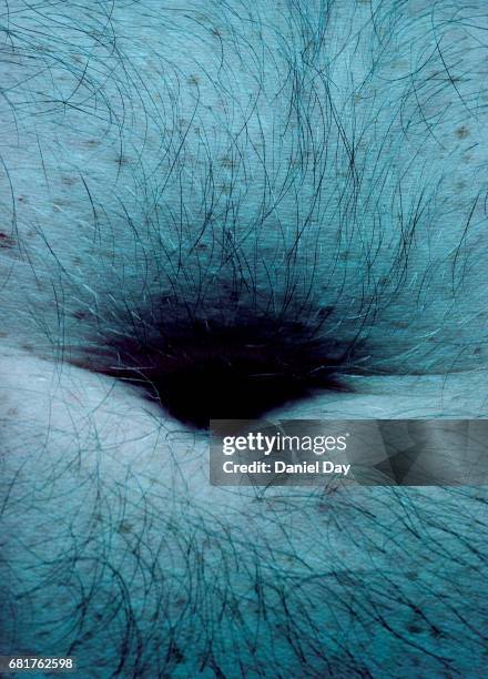 close up of a man's nipple and belly button - male belly button stock pictures, royalty-free photos & images